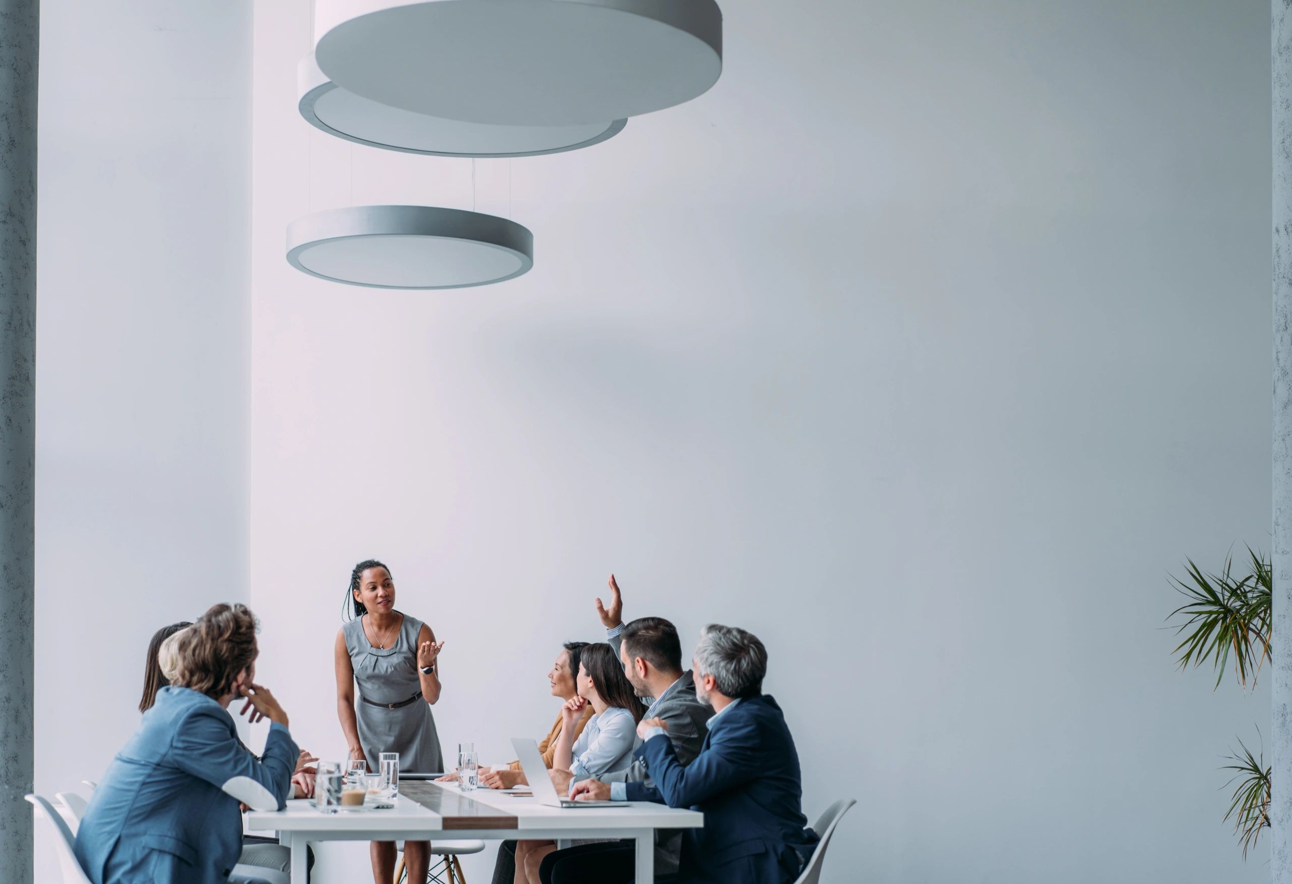 Business team discussing sales strategy in a boardroom